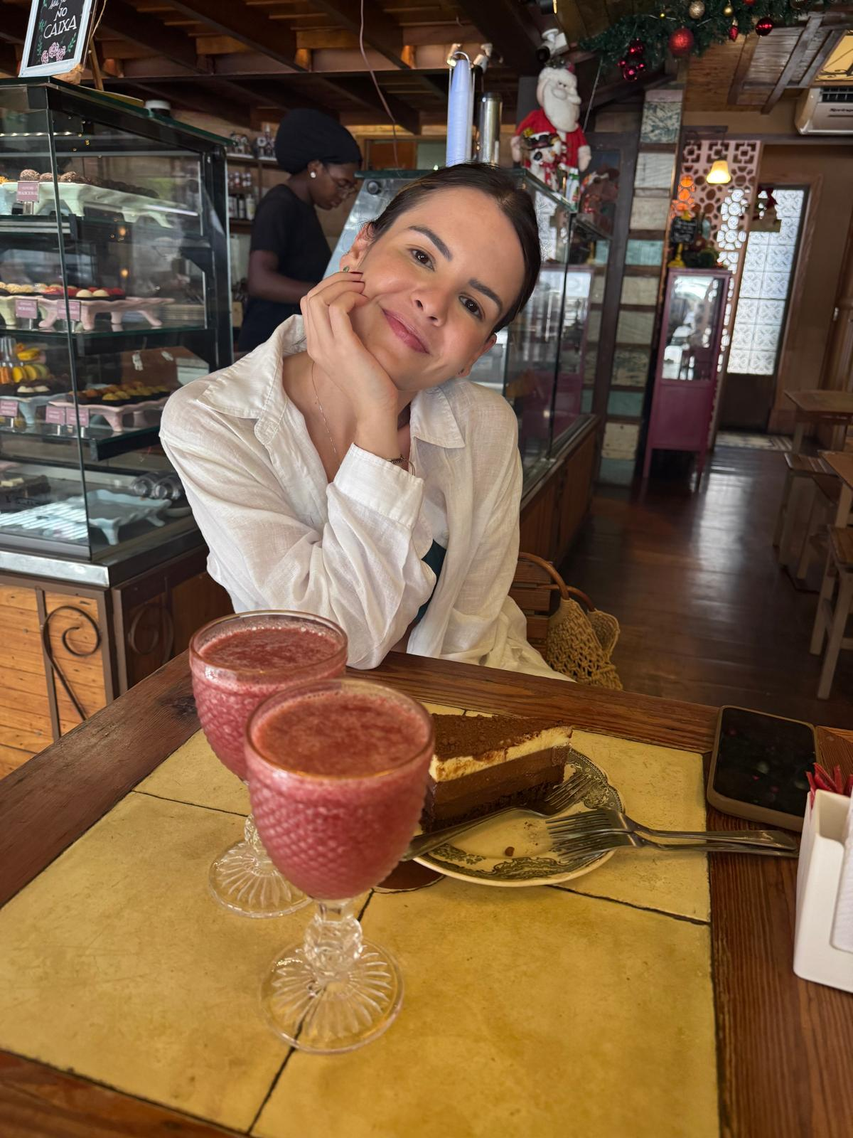 Karen at cafe with pink drinks